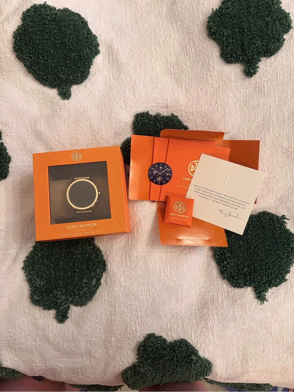 Tory Burch Navy Dial Watch with Gold Accents and Orange Packaging